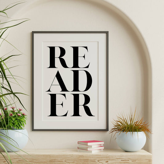 Framed poster with 'READER' text on a wall art – instant download minimalist book lover art.