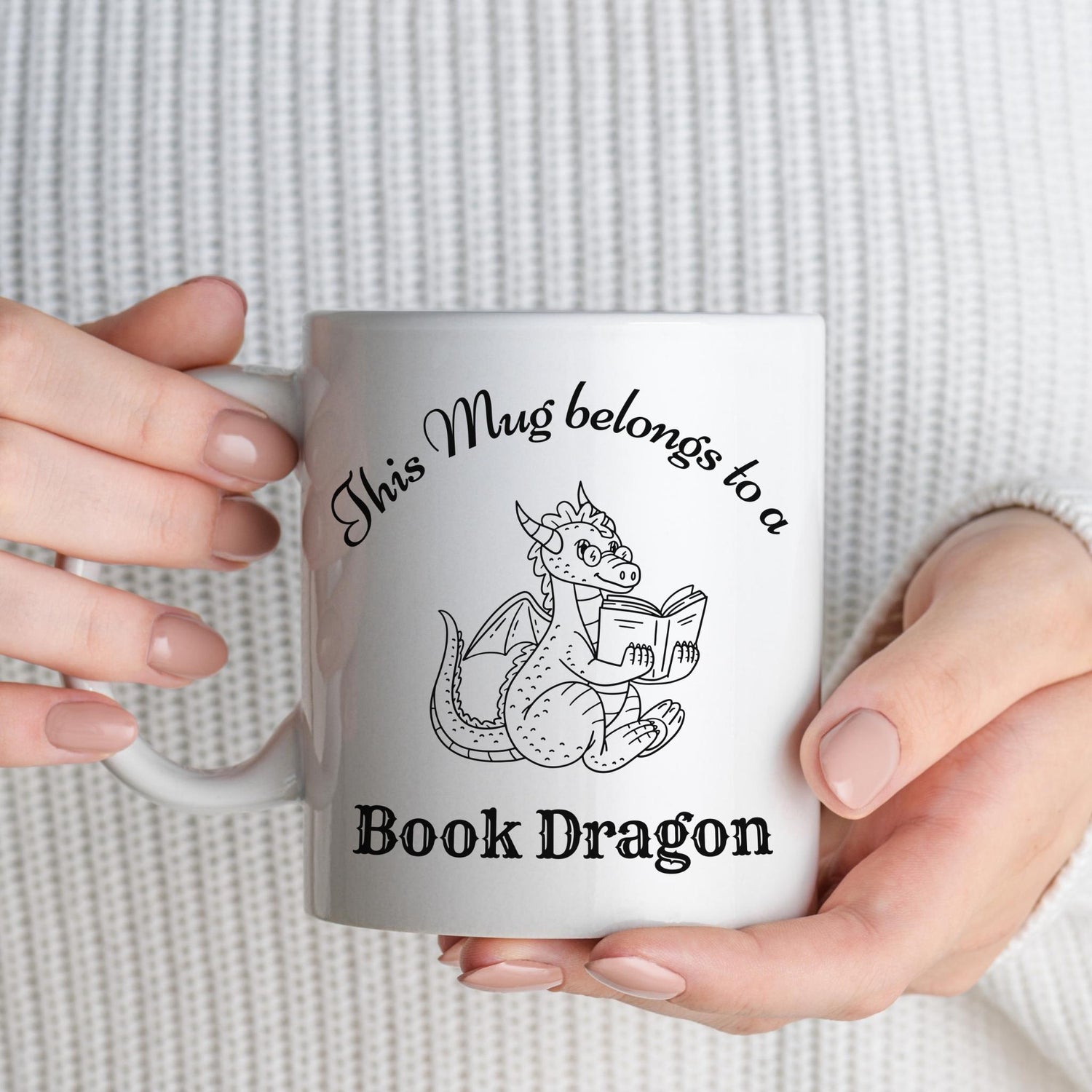 Book Dragon Mug – 11oz ceramic coffee cup with “This Mug Belongs to a Book Dragon” quote, fantasy lover gift for readers and bookworms.